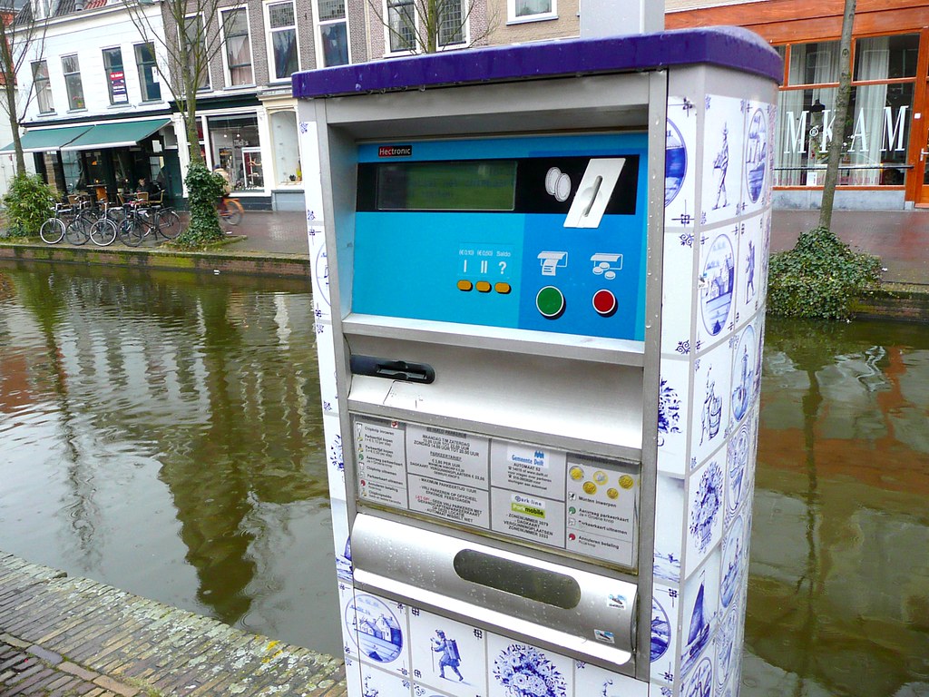 parking ticket machine covered in delft tiles